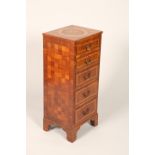 20th Century marquetry slim chest of five drawers, geometric marquetry design, raised on bracket