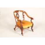 Victorian rosewood framed open tub chair carved splats and scroll elbows, with a studded stuff