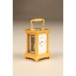 Minature French brass carriage clock, white enamel rim, with Roman numerals, stamped for Richard cie