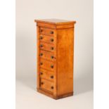 Birds eye maple Wellington chest of seven drawers with wooden turned handles. 53cm long 114cm high