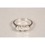 Ladies three stone diamond ring on platinum shank, central stone 0.33 carat flanked either side by a