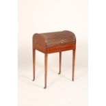 A fine Edwardian mahogany roll top ladies writing desk, roll top revealing a hinged leather topped