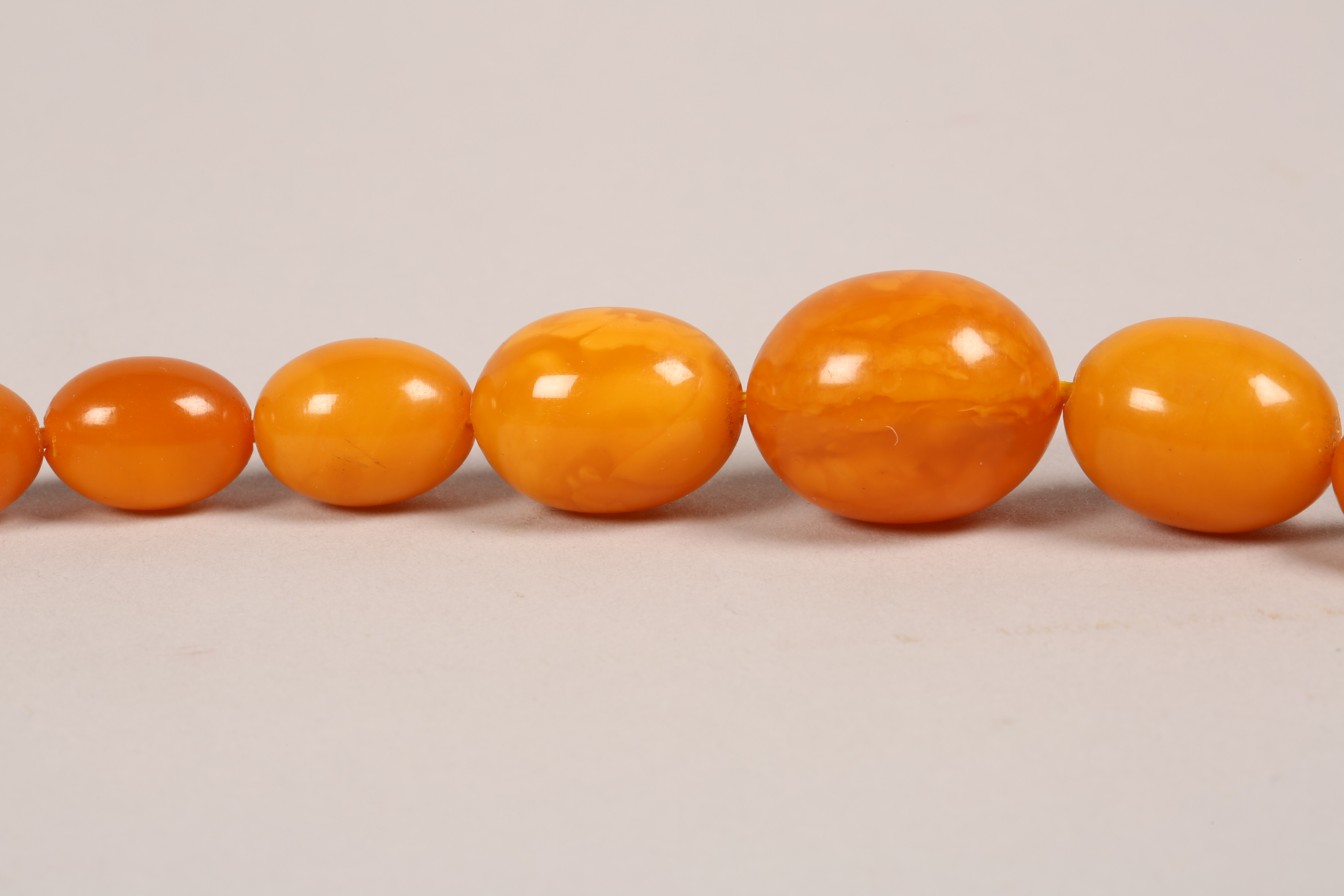 19th Century amber bead necklace (restrung) 69cm long, largest bead 20mm x 25mm. 53g - Image 5 of 7