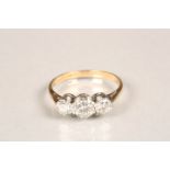 Ladies 18 carat gold three stone diamond ring, central 0.5 carat brilliant cut diamond flanked