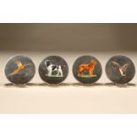 Set of four circular menu holders/place settings decorated with gun dogs and game. Assay marked