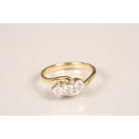 18 carat gold three stone diamond twist ring. Three brilliant cut 0.2 carat diamonds. Ring size N