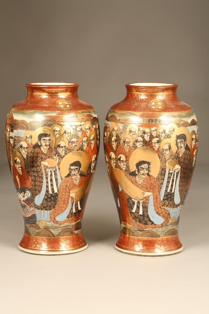 Pair Japanese Satsuma Pottery vases, baluster form, decorated with rakan and dragons. Meiji