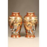 Pair Japanese Satsuma Pottery vases, baluster form, decorated with rakan and dragons. Meiji