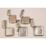 A collection of five assorted silver vesta cases, assay marked Birmingham 1918, Birmingham 1876,