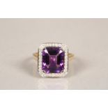 Ladies 18 carat yellow gold amethyst and diamond ring, central amethyst surrounded by thirty two