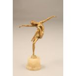 Continental Art Deco lady figure, raised on a white onyx base, unsigned. 25cm high