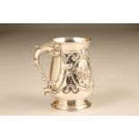 Victorian silver embossed tankard, scroll handle, embossed scroll and floral decoration. Assay