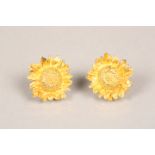 Boxed pair of Asprey 18 carat gold earrings in the form of flower heads. 18mm diameter, 6.1g