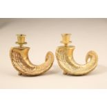 Pair of cast brass rams horn candlesticks, 13.5cm high 15cm long