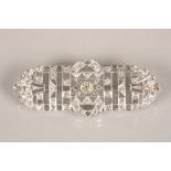 Ladies Art Deco diamond encrusted brooch, old cut diamonds set in unmarked white metal. Principal