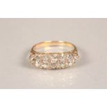 Ladies diamond cluster ring, twelve stone diamond cluster on yellow metal shank, ring size N