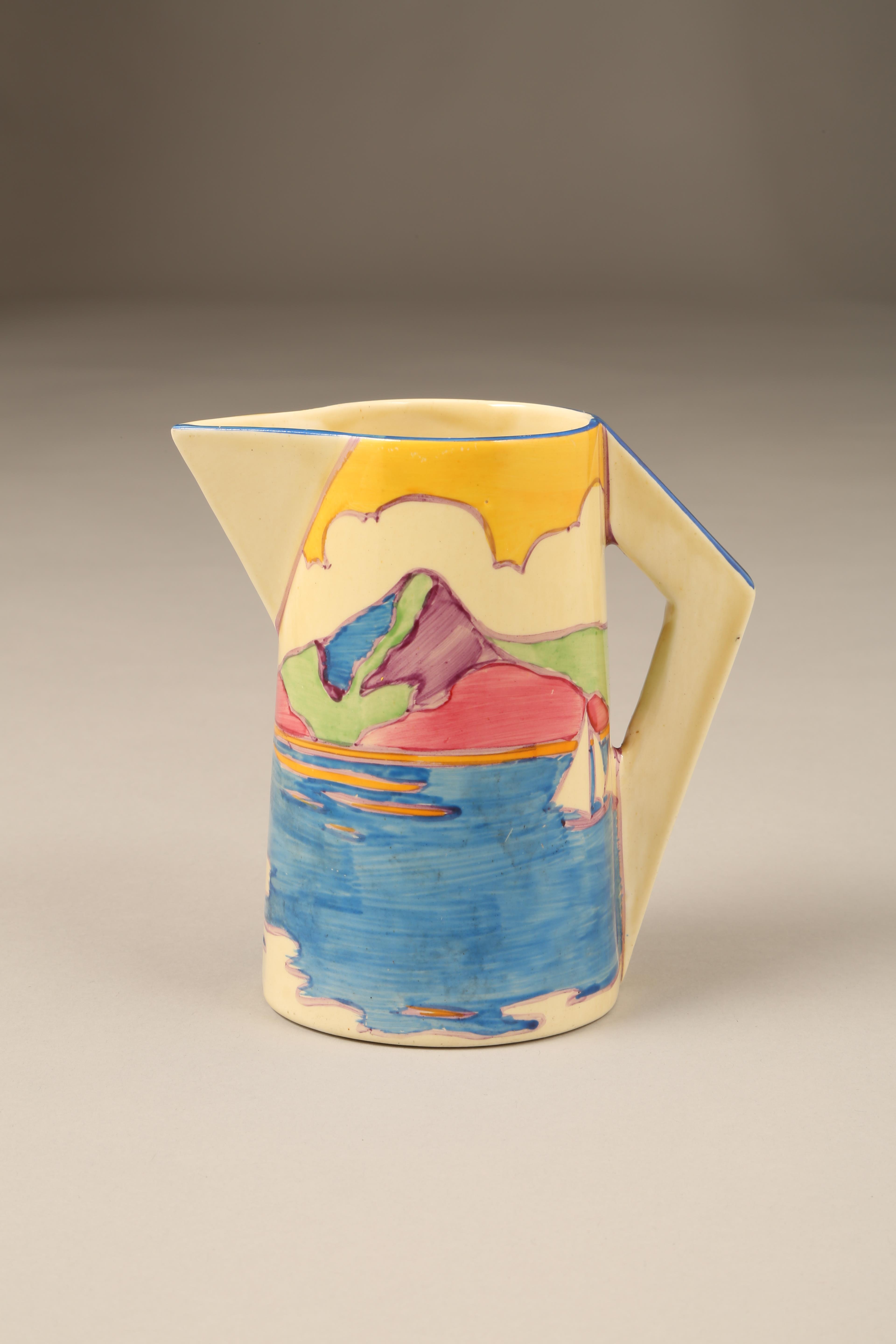 Clarice Cliff conical jug, in the Gibraltar Design, Fantasque and Bizarre marks. Height 13.5cm