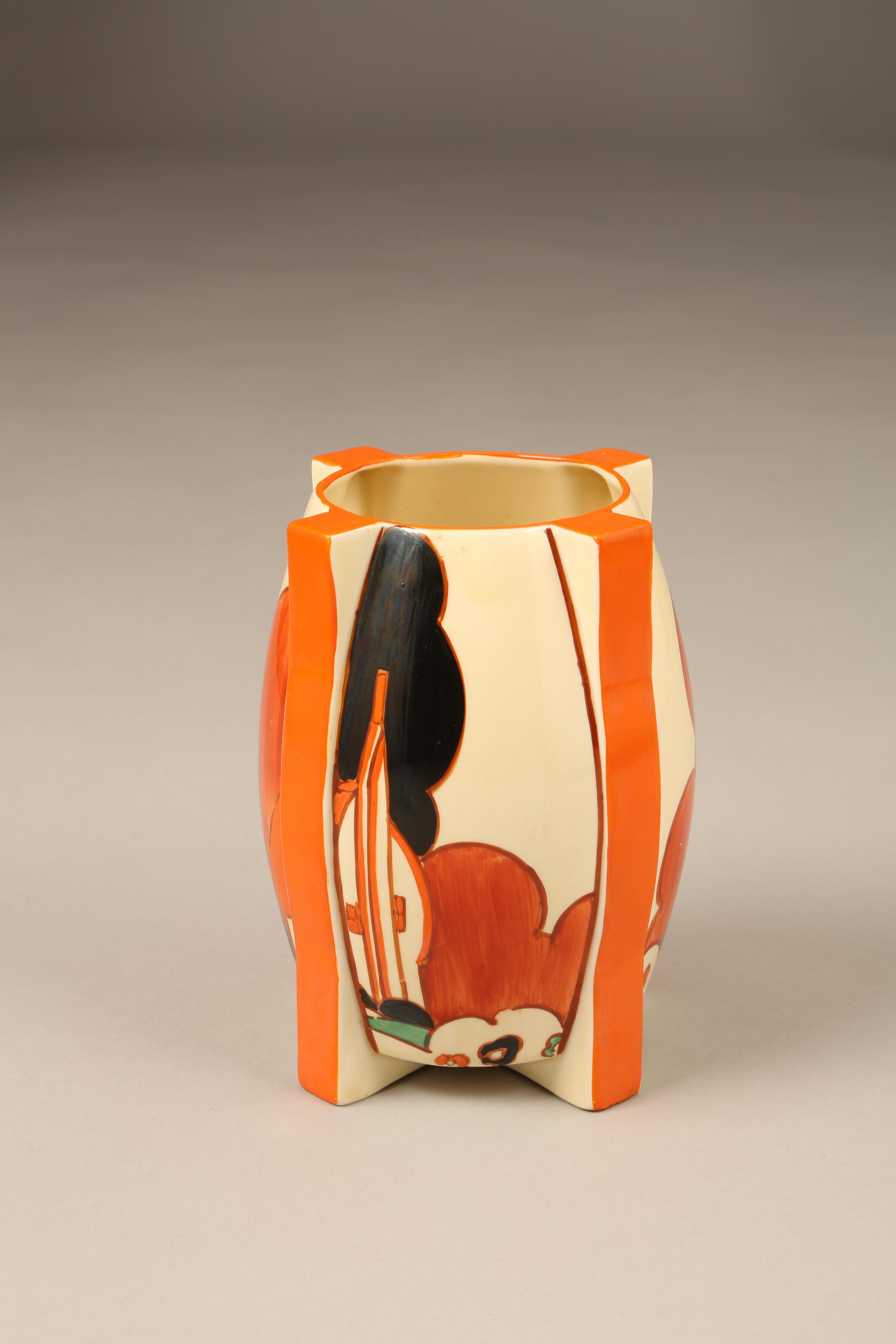 Clarice Cliff Bizarre vase, raised on four feet hand painted in the farmhouse pattern, signed