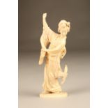 Japanese carved ivory figure, a dancing geisha girl signed to base, Meiji period. 19.5cm high