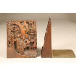 Pair 20th Century Chinese hardwood bookends, carved figure facias with hinged brass supports. 20.5cm