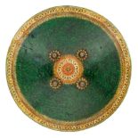 AN INDIAN LACQUERED HIDE SHIELD (DHAL), 19TH CENTURY of low convex form, the inside painted red