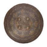 ‡ A PERSIAN SHIELD (DHAL), QAJAR,19TH CENTURY of shallow convex russet iron, fitted with four