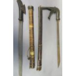TWO MORO SWORDS (KLEWANG), LATE 19TH CENTURY the first with single-edged blade with a triangular