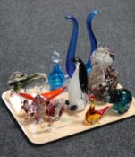 A tray of eleven coloured glass animal figures and vases