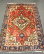 A Persian Nahavand rug, 200 cm x 140 cm.
