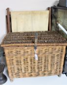 A wicker fishing basket together with a folding seat