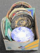 A box of assorted collector's plates and wall plates,