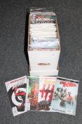 A box containing 21st century comics to include Deadpool, Captain America,