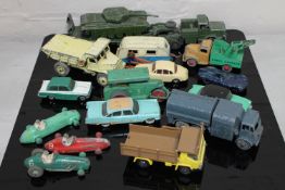 A box containing mid 20th century Dinky die cast vehicles