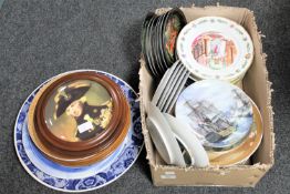 A large quantity of assorted wall and cabinet plates including Royal Worcester Christmas plates,