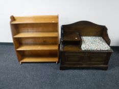 An oak telephone table together with a set of mid 20th century teak open bookshelves