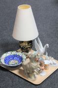 A tray containing Maling bowl, Royal Winton table lamp with shade, two Nao figures,