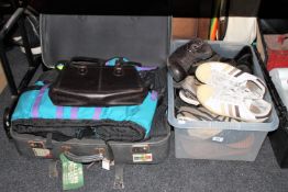 A suitcase and box containing gents coats including Berghaus,