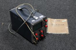 A Telequipment Type S54A oscilloscope, together with the original instruction manual.