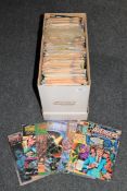 A box containing late 20th century DC and Marvel comics including Ghost Rider, Rom,