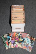 A box containing late 20th century DC and Marvel comics including Indiana Jones,