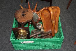 A plastic crate containing pine milking stool, fruit bowl, metal cannon, beer stein,