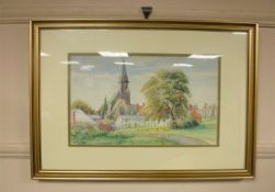 J. Whitfield : A village green with church beyond, watercolour, 44 cm x 26 cm, signed, framed.