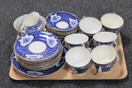 A tray containing a thirty-nine piece antique English blue and white china tea service