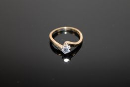 An 18ct gold diamond solitaire ring, size J, approximately 0.