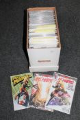 A box containing 21st century Marvel comics including Miss Marvel, The Mighty Avengers,