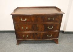 A 19th century mahogany bow fronted chest of three drawers, width 107 cm.