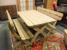 A hardwood garden bench table, on X frame, together with a pair of matching benches, length 160 cm.