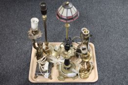 A tray of four continental brass table lamps, one modelled as a cherub,