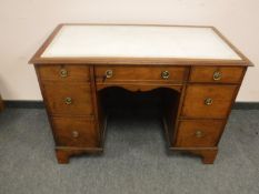 An early Victorian mahogany pedestal desk with white leather insert, width 101 cm.