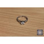 An 18ct white gold diamond solitaire ring,